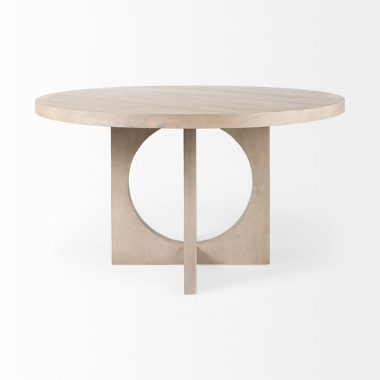 Mercana Liesl circular top dining table with a sleek design and sturdy base, set in a stylish dining room setting.
