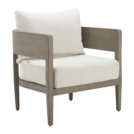 Zuo Foret Armchair in beige with modern design, featuring cushioned seat and backrest, placed in a cozy living room setting.