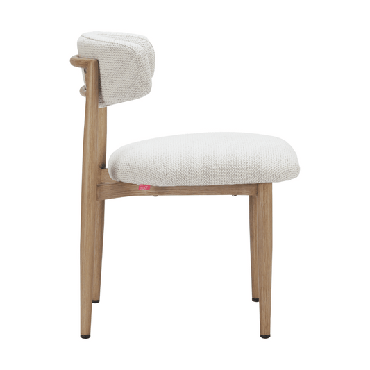 Zuo Bege dining chair with modern design, wooden legs, and upholstered seat for contemporary dining room decor.