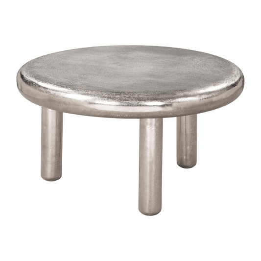 Zuo Arian silver coffee table with sleek design and reflective surface, set in a modern living room.