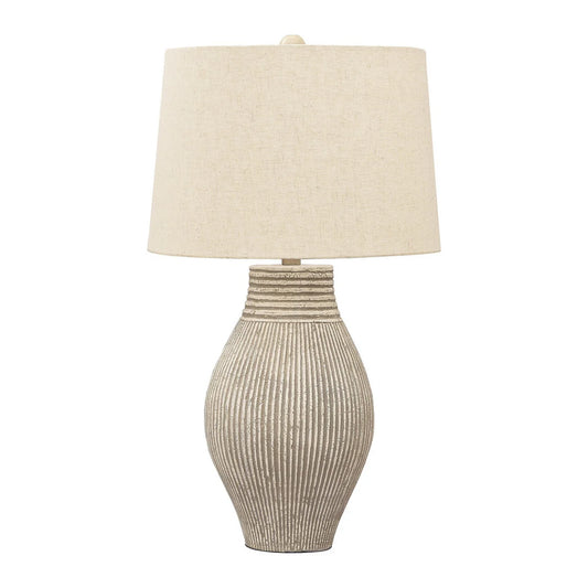 Papyrus ribbed table lamp by Benzara with textured surface and warm lighting, ideal for modern living room decor.