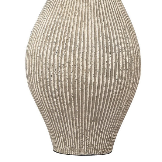 Papyrus ribbed table lamp by Benzara with textured cylindrical base and fabric shade, ideal for enhancing living room decor.