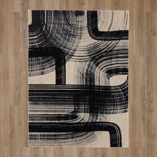 Alesandro Orion Obsidian area rug by Karastan, featuring a rich black design with intricate patterns and a soft texture.