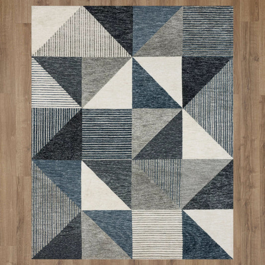 Blue Emanuele Oblique Area Rug by Karastan, showcasing a modern geometric pattern in a 5'3" x 7'10" size.