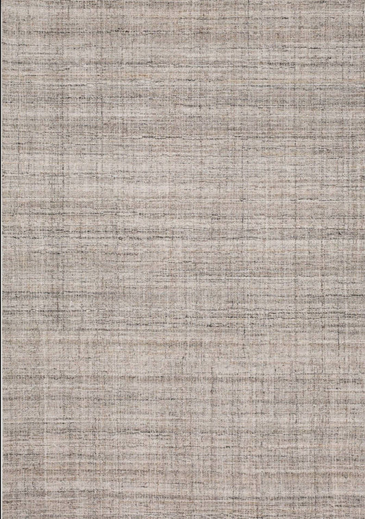 Karastan Agatino Haberdasher Drizzle area rug in soft colors, featuring an elegant pattern and a plush texture.