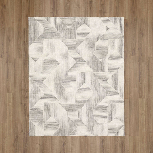 Karastan Carlino Algiers black and white area rug with intricate geometric patterns, measuring 6x9 feet.