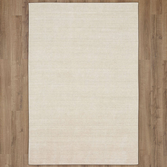 Karastan Samuel Gemini area rug in ivory, 5x8 feet, with intricate geometric patterns and soft textures for living spaces.